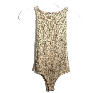 GAZE LEOPARD PRINT ONESIE
SIZE SMALL